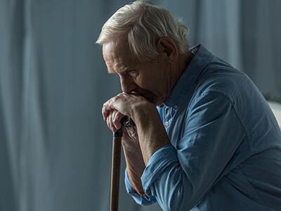 ResourcesImage41211051242 Depressed adult holding stick